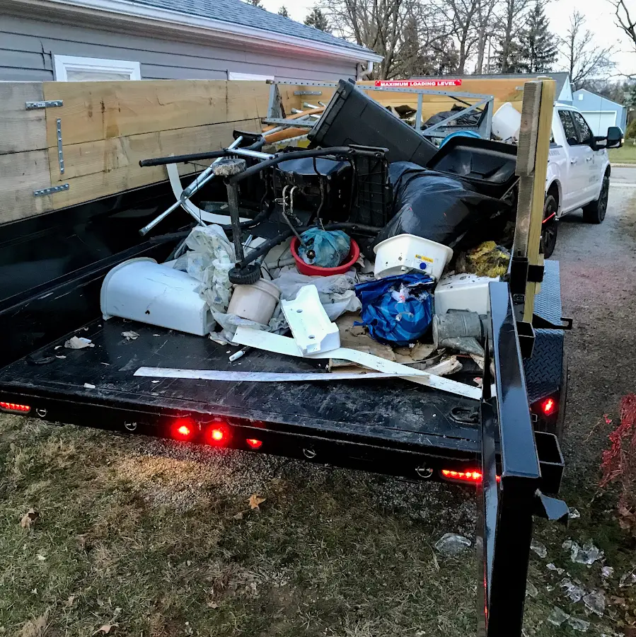 Roll-off dumpster delivered to a residential driveway in Hiawatha