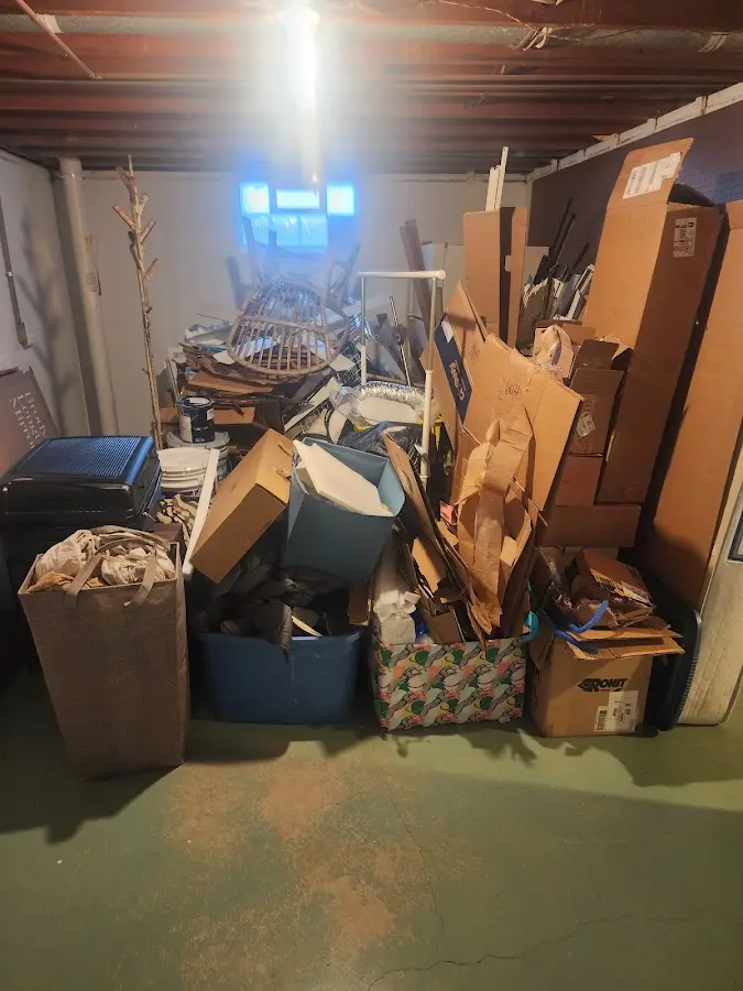 Roll-off dumpster container at job site for Concrete Dumpster Rental in Hiawatha